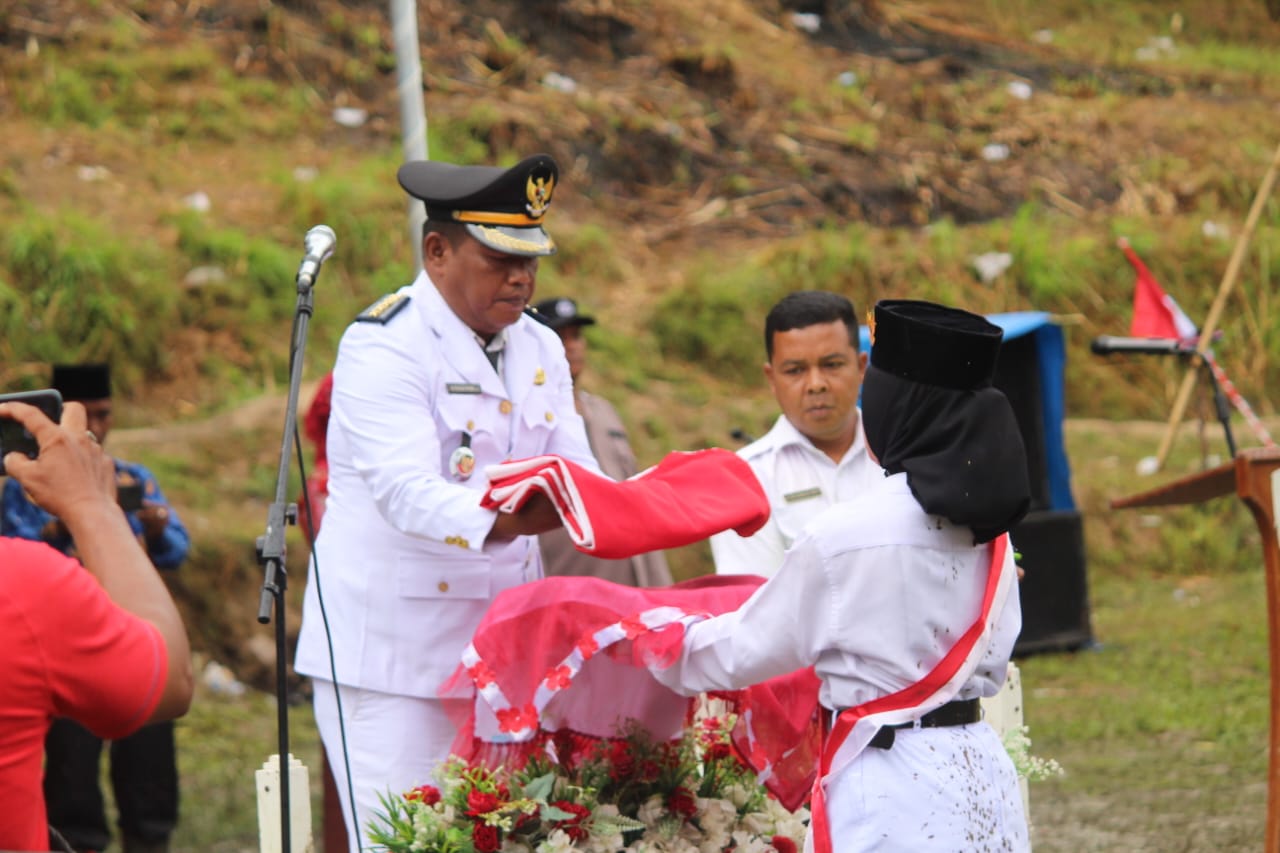 Hujan Gerimis, Ahmad Pamilu Daulay.S.Sos Irup HUT Ke -78 RI di Kec.Muarasipongi